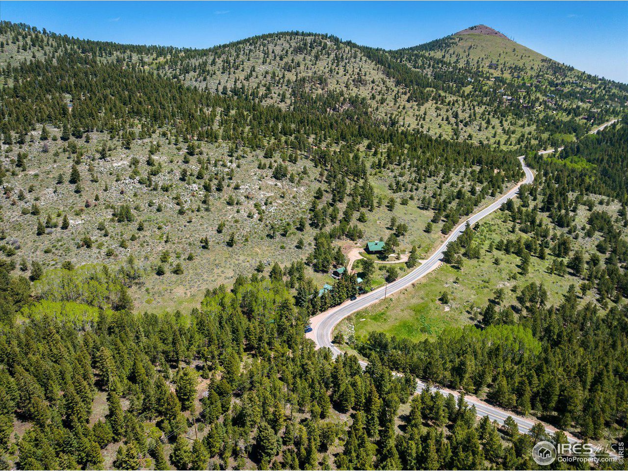 5690 Sugarloaf Road Boulder, CO 80302 - Photo 27 of 27 a view of a large building with a yard
