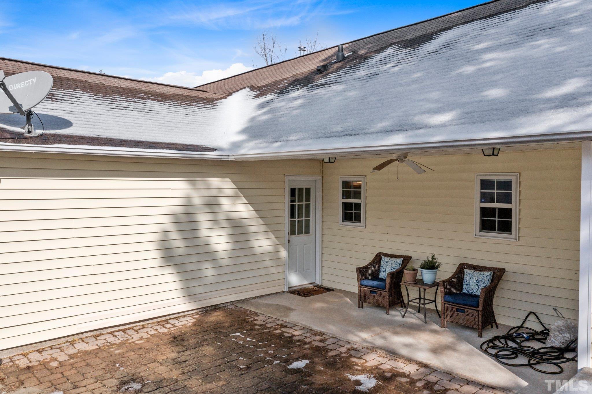 5022 Silhouette Drive Durham, NC 27713 - Photo 19 of 26 a backyard of a house with seating space