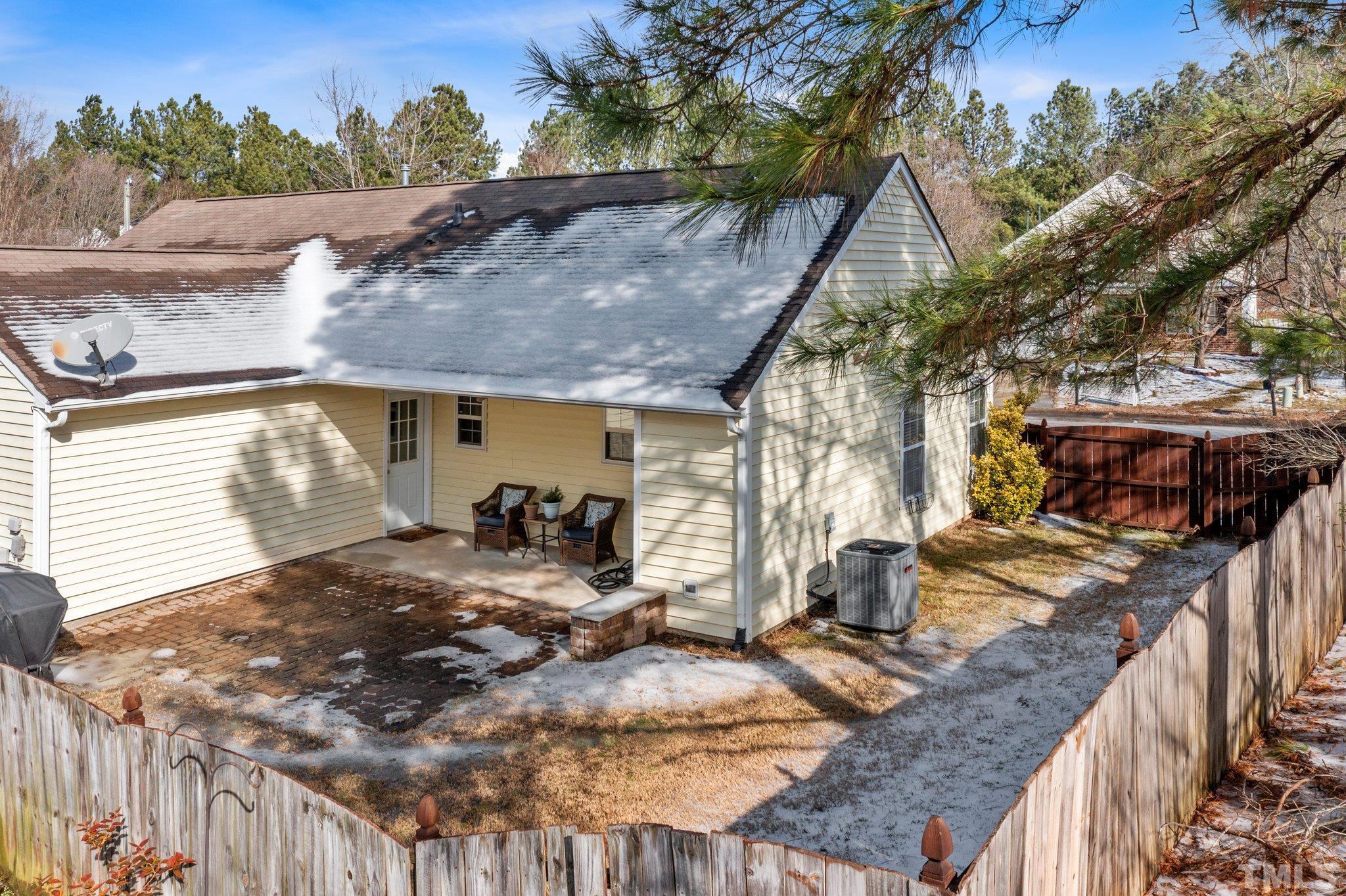 5022 Silhouette Drive Durham, NC 27713 - Photo 20 of 26 a view of a house with backyard