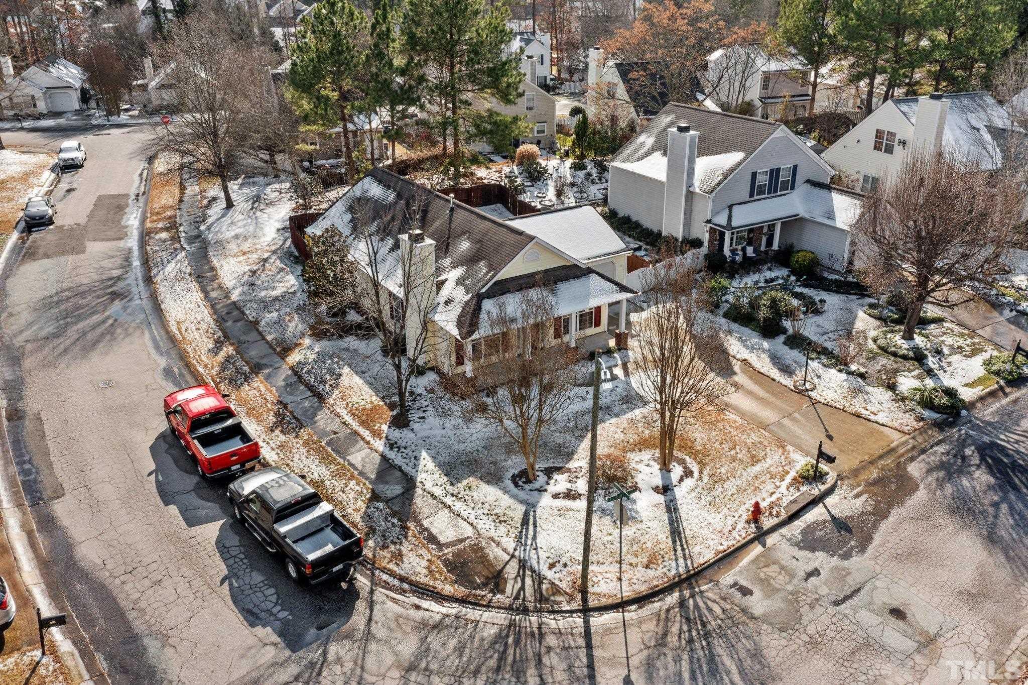 5022 Silhouette Drive Durham, NC 27713 - Photo 22 of 26 an aerial view of multiple houses with yard