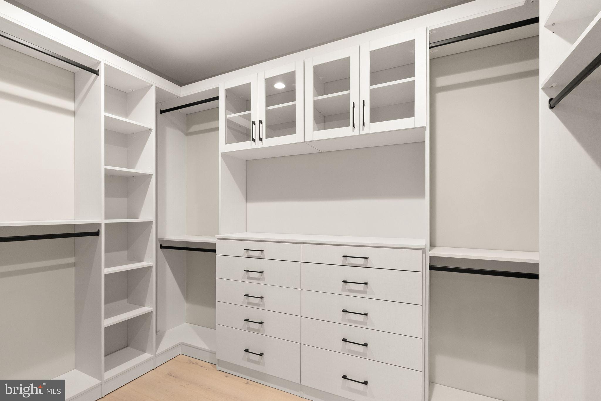 6329 Halsey Road McLean, VA 22101 - Photo 55 of 94 Sleek, modern closet with ample storage.