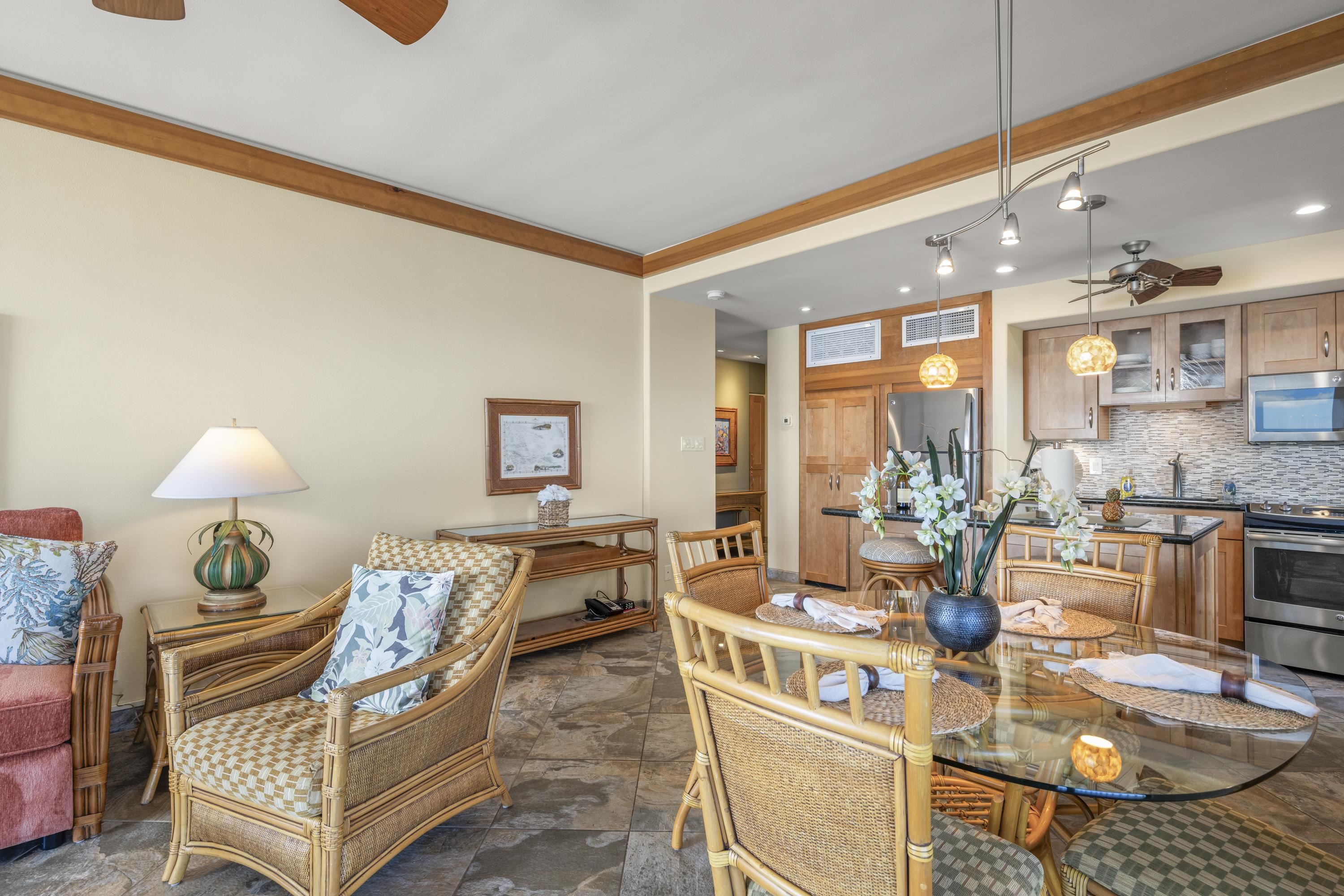 475 Front Street, Unit 601 Lahaina, HI 96761 - Photo 12 of 24 a living room with fireplace furniture and a large window