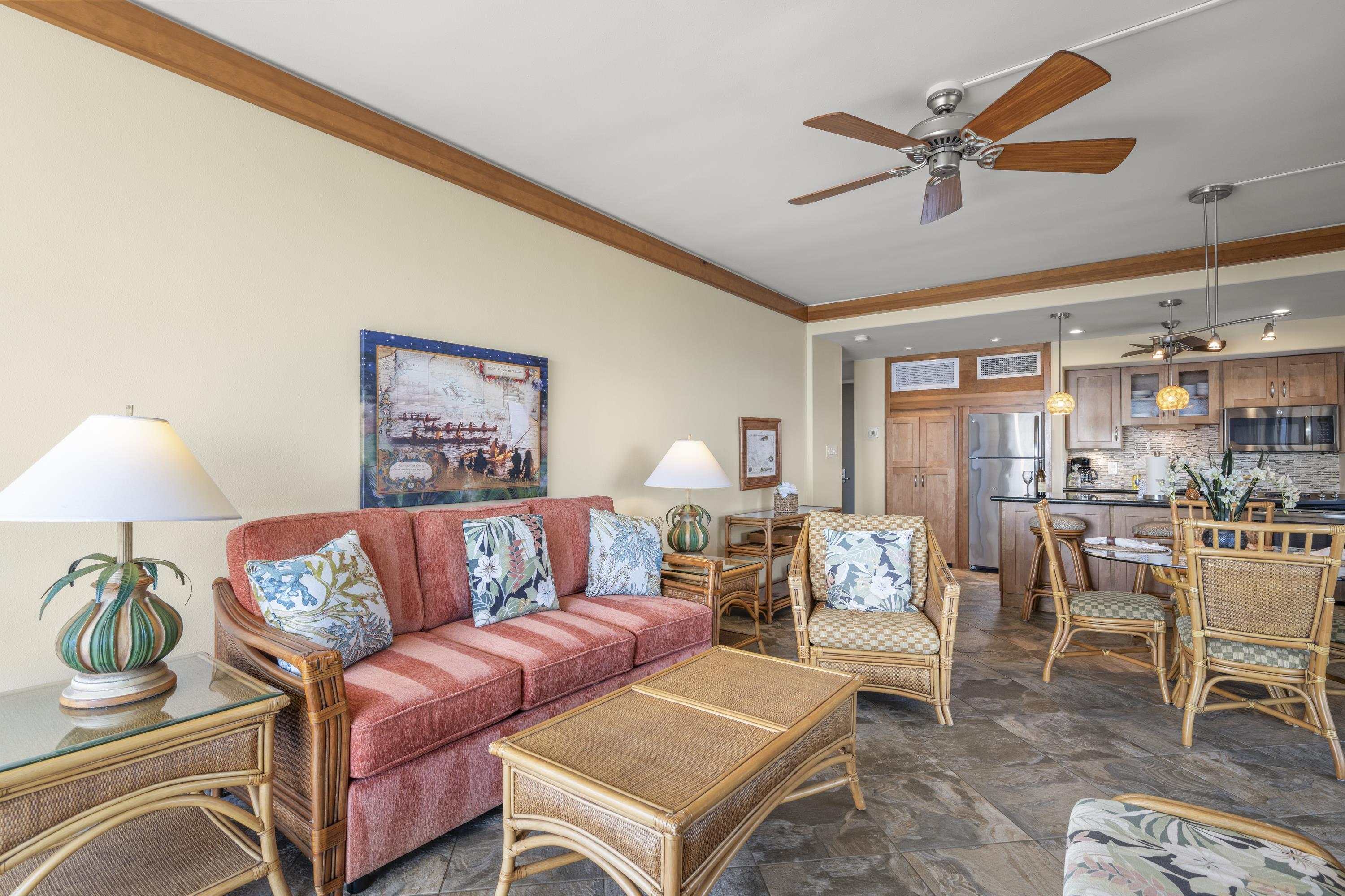 475 Front Street, Unit 601 Lahaina, HI 96761 - Photo 13 of 24 a living room with furniture and a chandelier