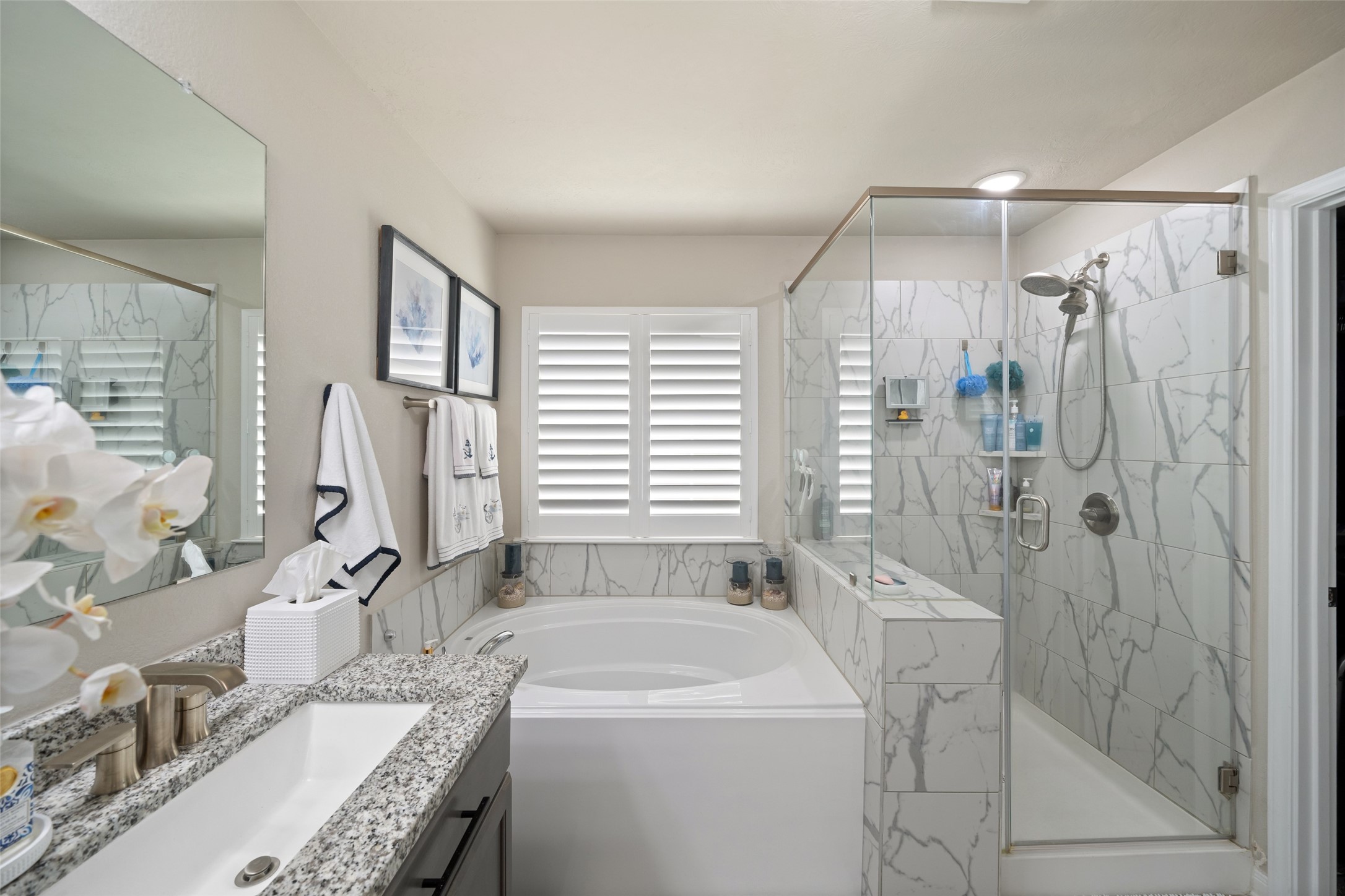 1300 Kingsgate Drive Bryan, TX 77807 - Photo 19 of 30 Plantation shutter continue into the bath and this gorgeous shower