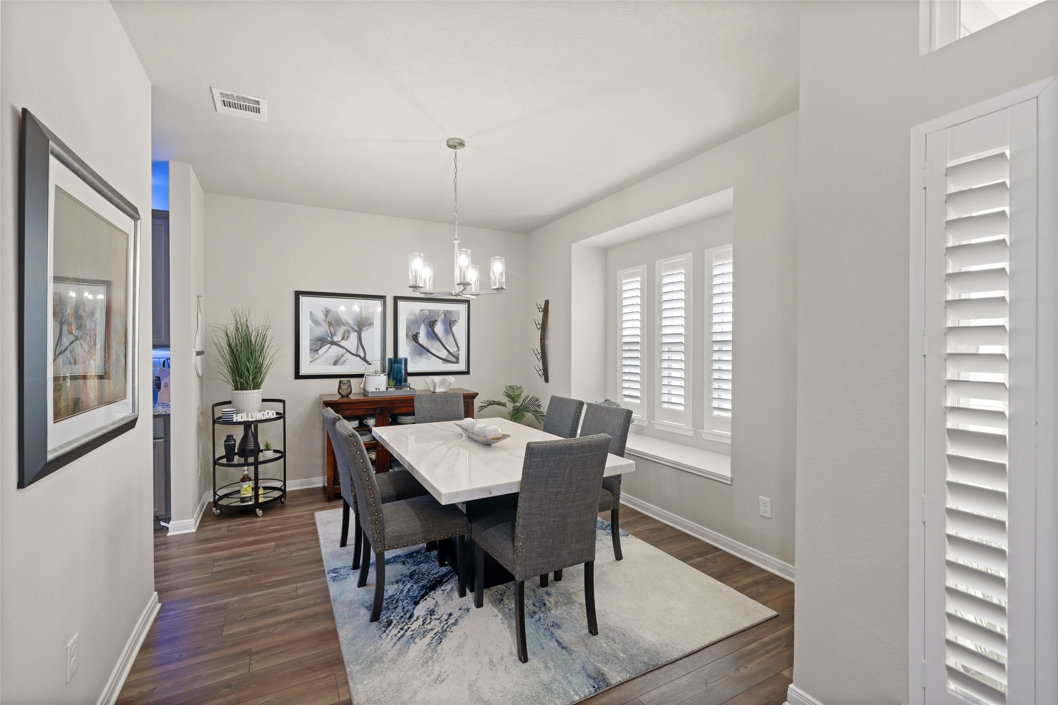 1300 Kingsgate Drive Bryan, TX 77807 - Photo 5 of 30 Formal dining off entry at front of house. Plantation shutters!