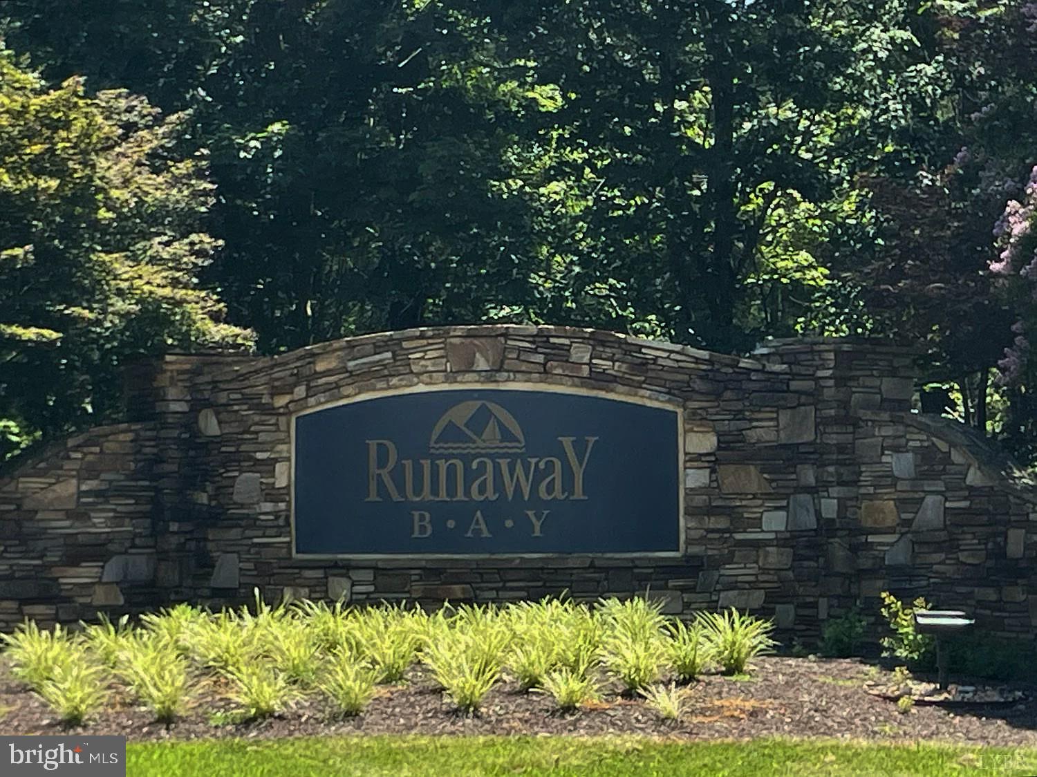 1180 Runaway Bay Road Lynch Station, VA 24571 - Photo 6 of 14 a sign on the side of a building