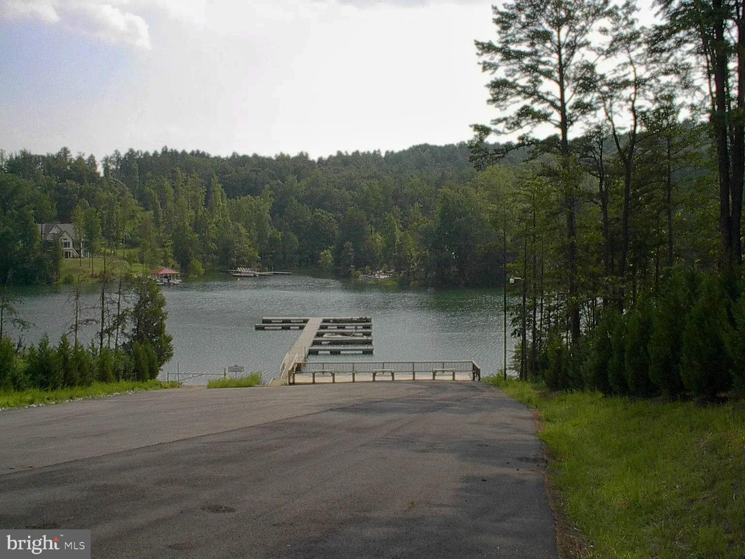 1180 Runaway Bay Road Lynch Station, VA 24571 - Photo 7 of 14 a view of a street with a yard