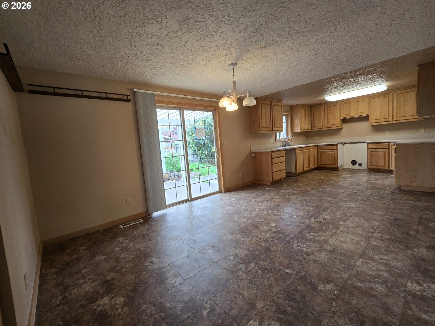 2633 42nd Avenue Longview, WA 98632 - Photo 15 of 32 a view of a kitchen with a sink and cabinets