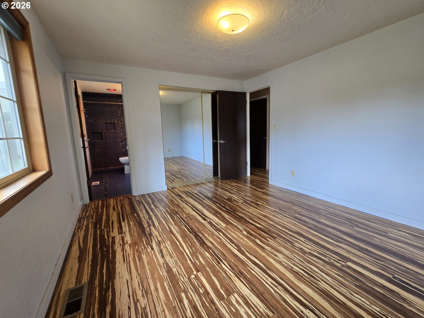 2633 42nd Avenue Longview, WA 98632 - Photo 20 of 32 wooden floor in an empty room