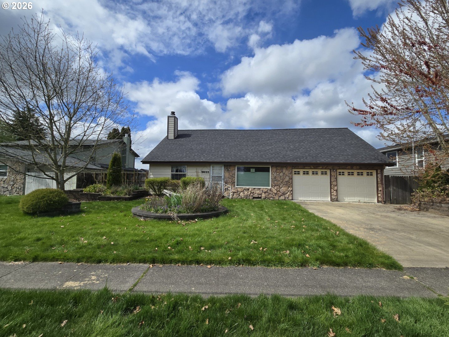 2633 42nd Avenue Longview, WA 98632 - Photo 2 of 32 a view of a house with a garden