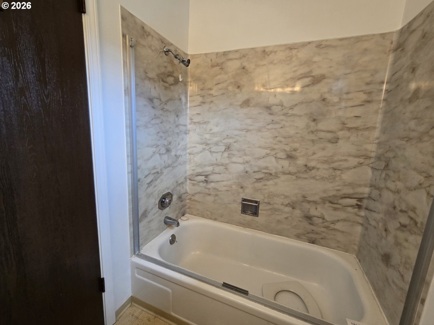 2633 42nd Avenue Longview, WA 98632 - Photo 26 of 32 a bathroom with a bathtub