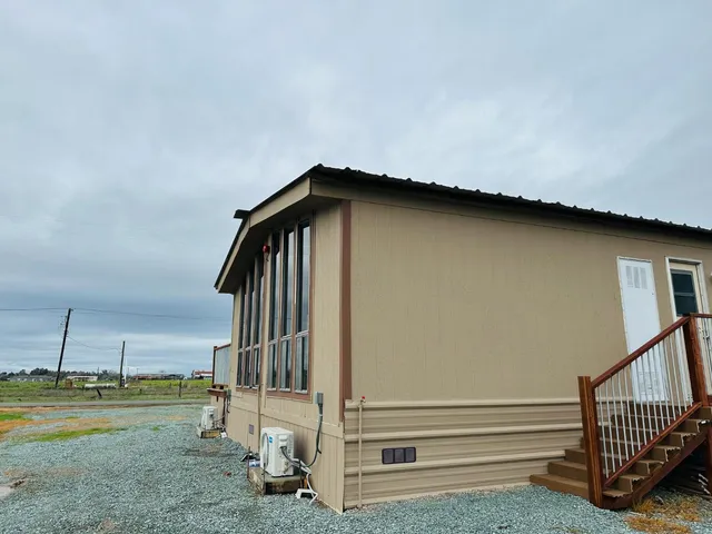 a view of a house with a deck