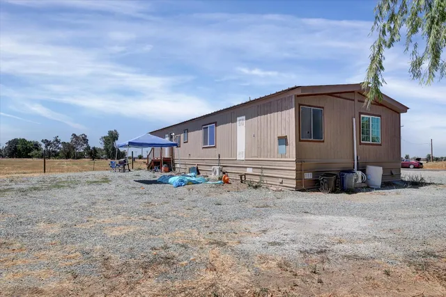 a view of a house with a patio