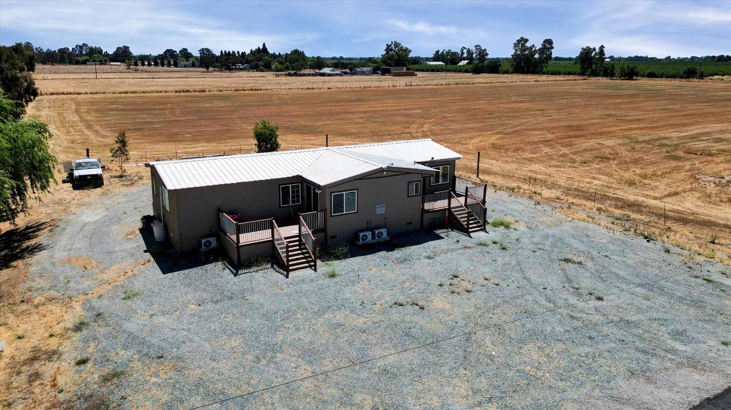 11705 Simmerhorn Road Galt, CA 95632 - Photo 37 of 39 a view of a lake with a terrace