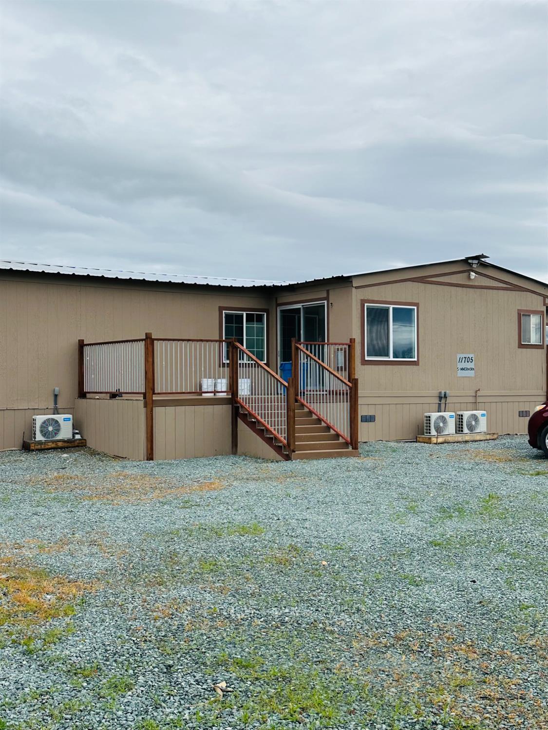 11705 Simmerhorn Road Galt, CA 95632 - Photo 10 of 39 a view of a house with backyard