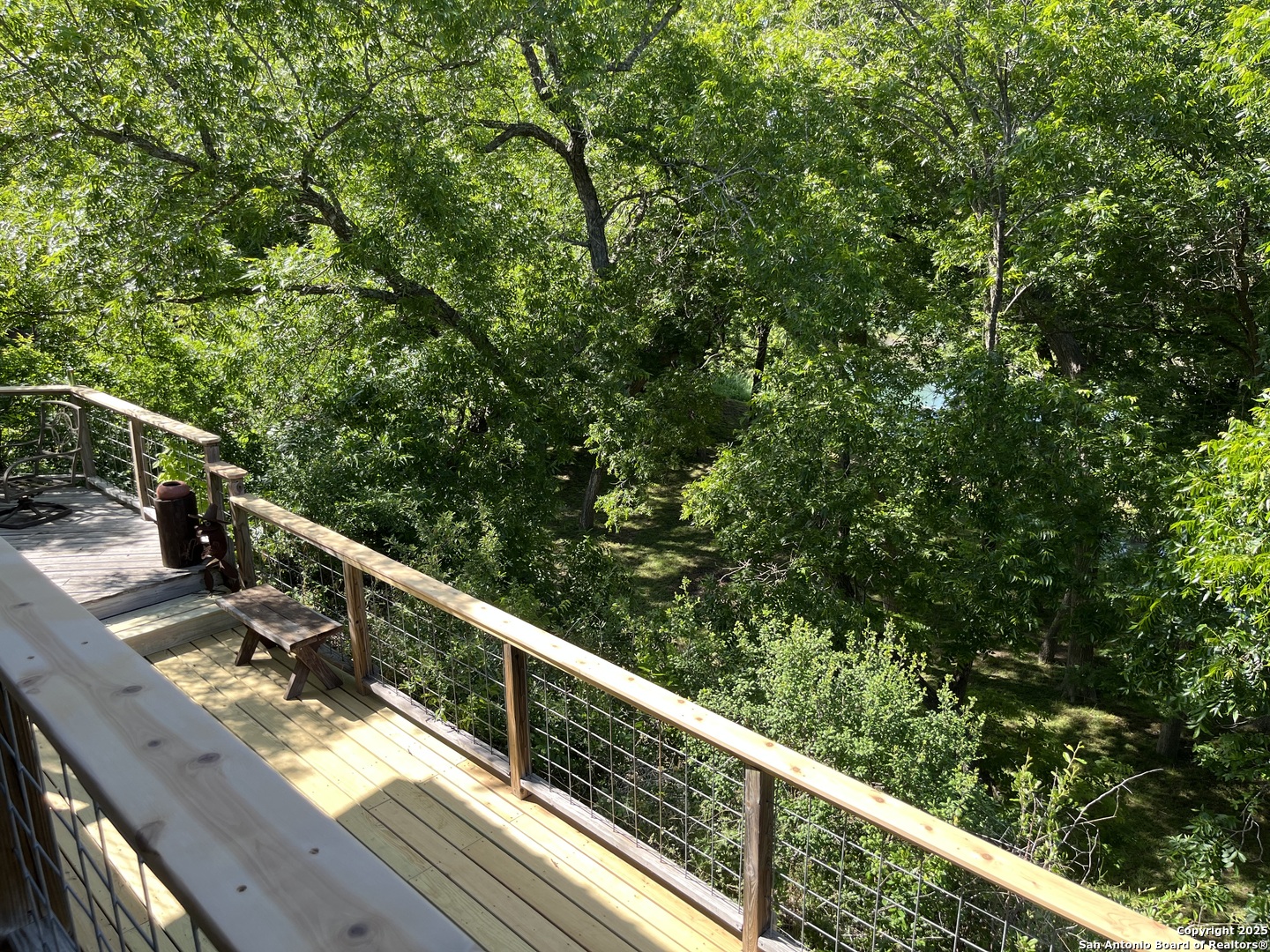 412 Field Road Fischer, TX 78623 - Photo 12 of 42 a view of balcony with wooden floor and fence