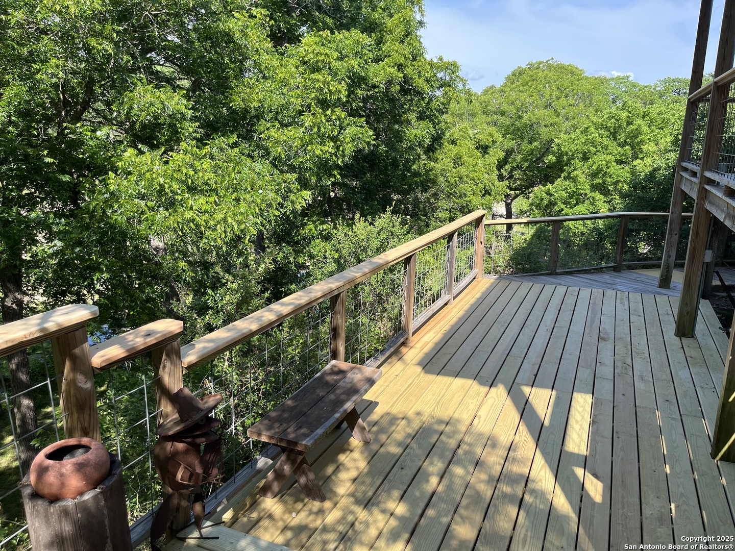 412 Field Road Fischer, TX 78623 - Photo 13 of 42 a view of balcony with wooden floor and outdoor seating