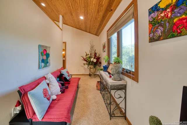 a spacious bathroom with a bathtub and a sink