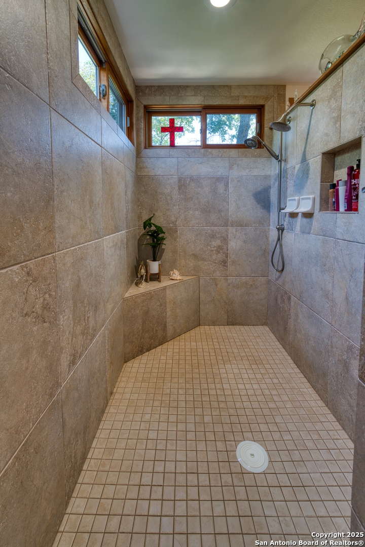 412 Field Road Fischer, TX 78623 - Photo 20 of 42 a bathroom with a shower