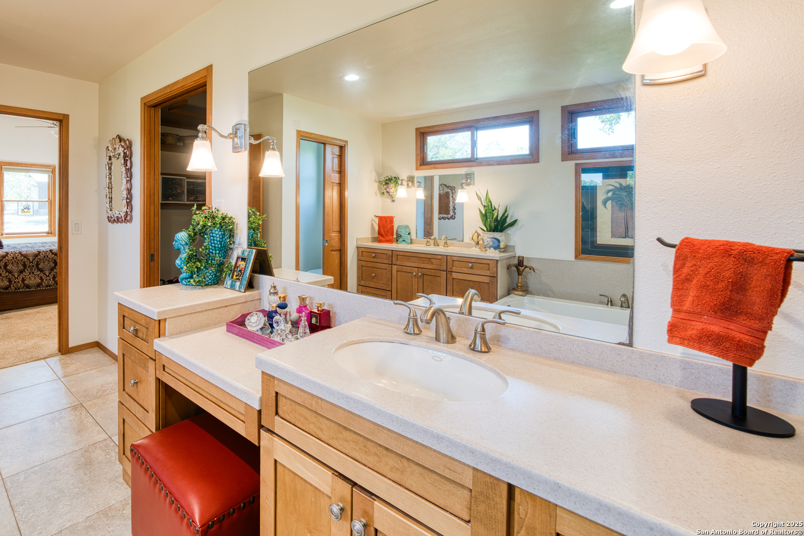 412 Field Road Fischer, TX 78623 - Photo 21 of 42 a bathroom with a sink and a mirror