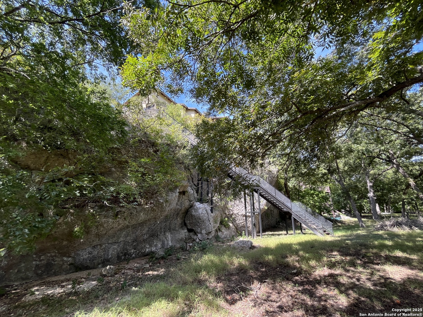 412 Field Road Fischer, TX 78623 - Photo 40 of 42 a view of a house with a tree