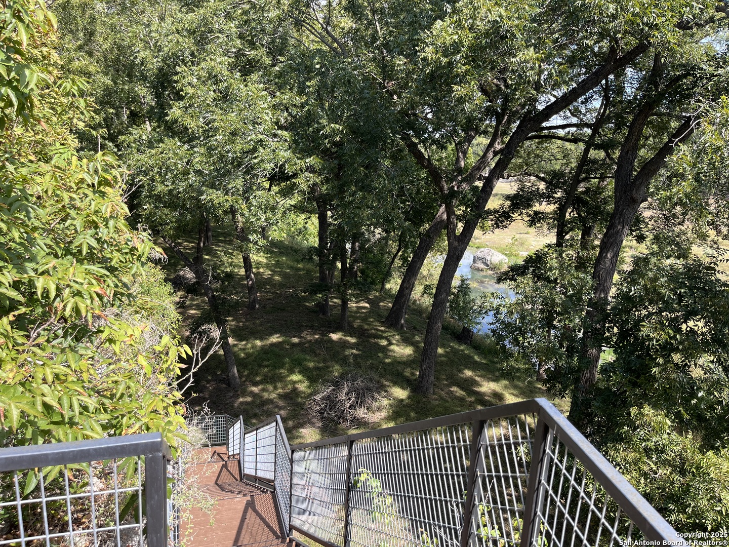 412 Field Road Fischer, TX 78623 - Photo 41 of 42 a view of a balcony with a tree