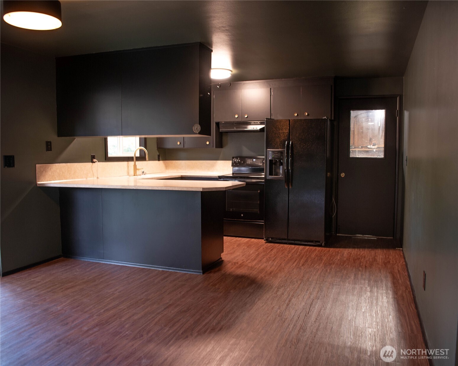 116 Old Hill Road Aberdeen, WA 98520 - Photo 5 of 13 a kitchen with stainless steel appliances granite countertop a sink stove and refrigerator