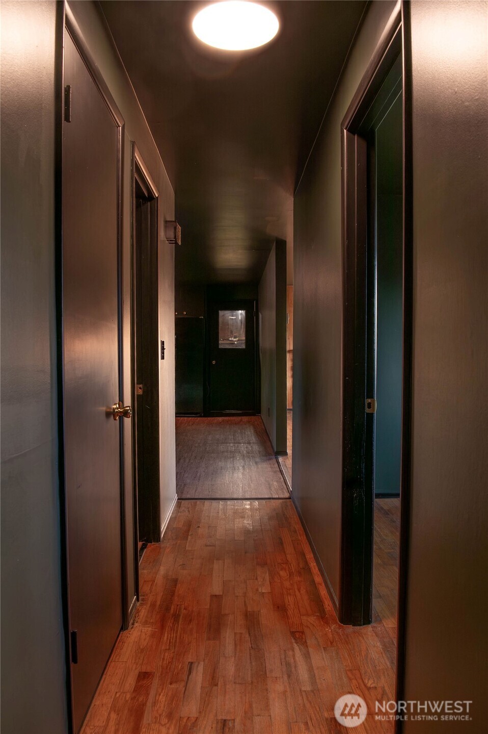 116 Old Hill Road Aberdeen, WA 98520 - Photo 10 of 13 a view of a hallway with wooden floor