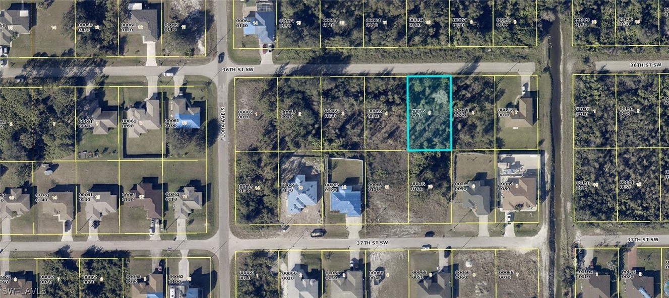 2705 36th Street Southwest Lehigh Acres, FL 33976 - Photo 1 of 3 a bird view of a lake