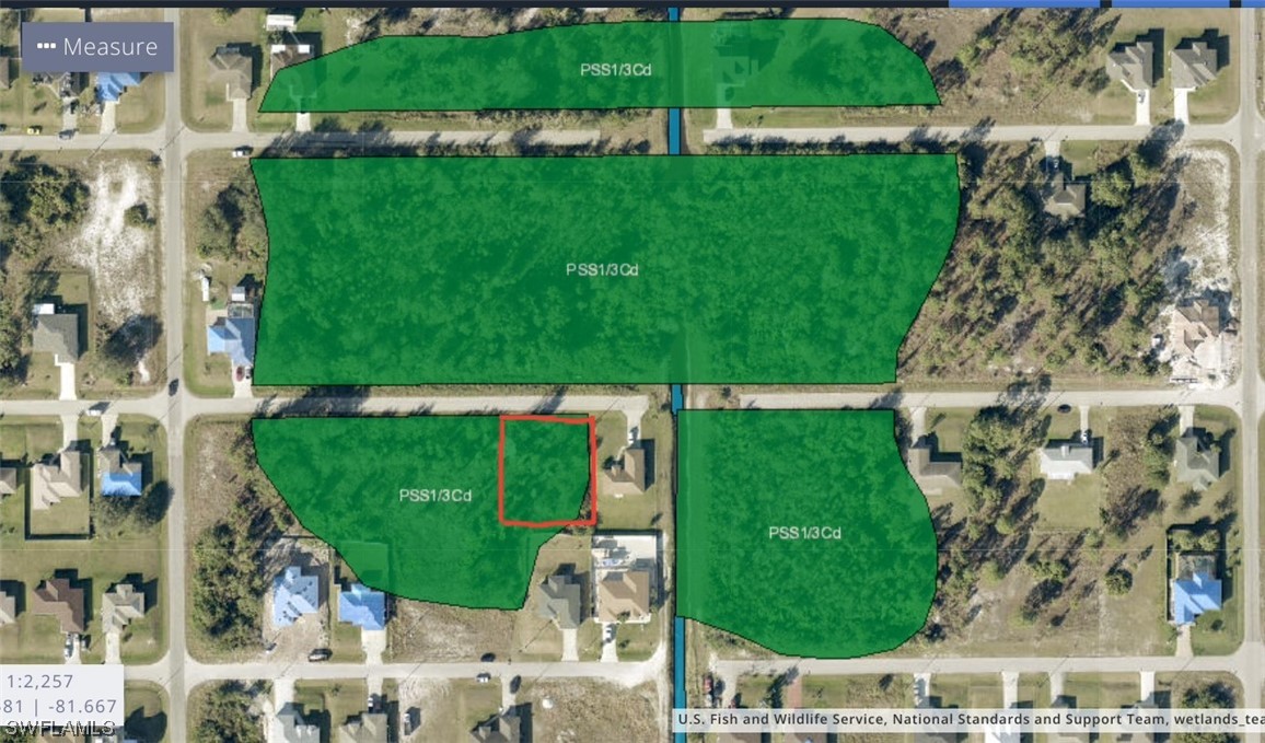 2705 36th Street Southwest Lehigh Acres, FL 33976 - Photo 3 of 3 an aerial view of a houses with outdoor space