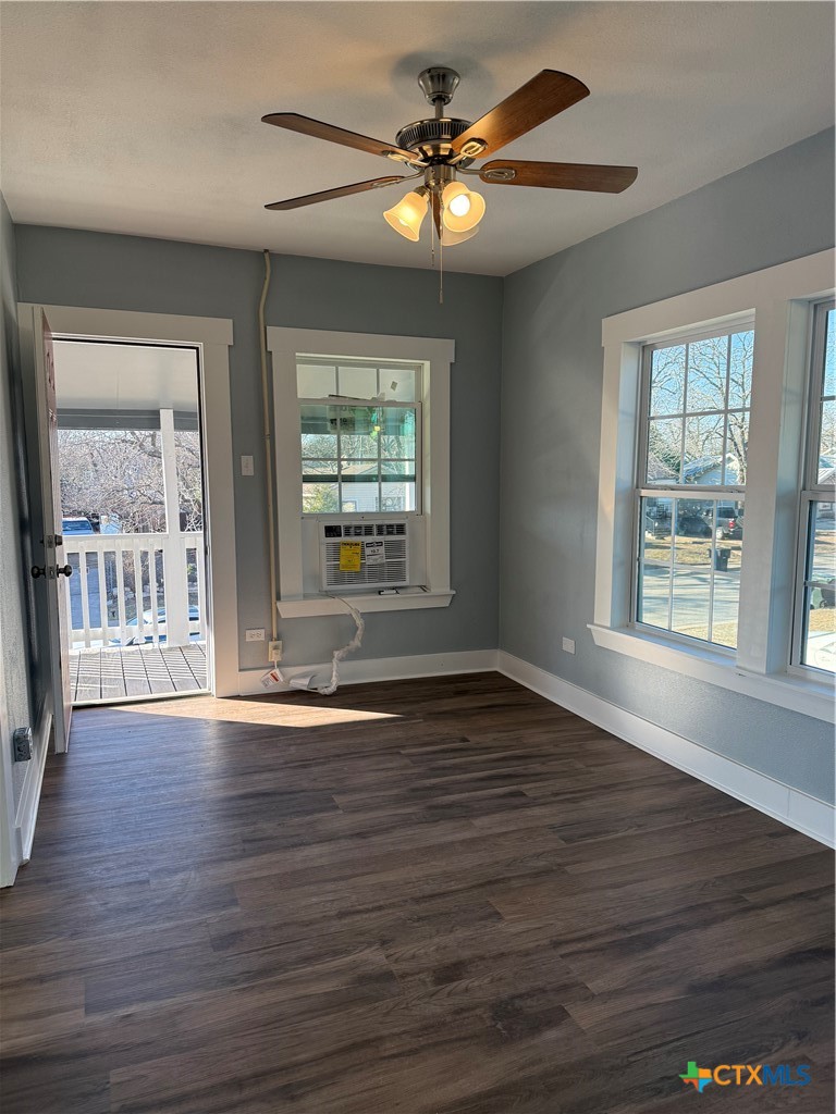 917 South 4th Street Temple, TX 76504 - Photo 22 of 30 a view of an empty room with wooden floor and a window