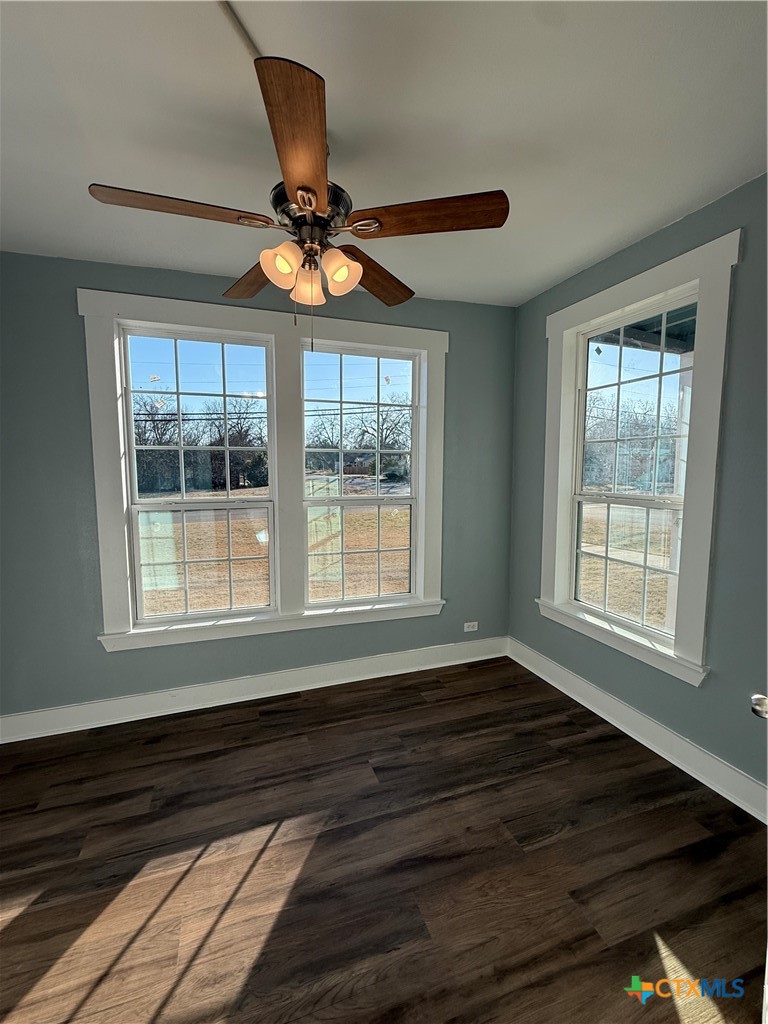 917 South 4th Street Temple, TX 76504 - Photo 27 of 30 a view of an empty room with wooden floor and a window