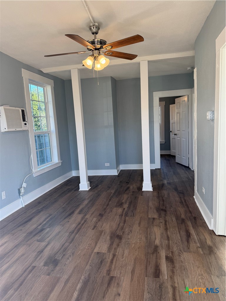 917 South 4th Street Temple, TX 76504 - Photo 28 of 30 a view of a livingroom with wooden floor and staircase