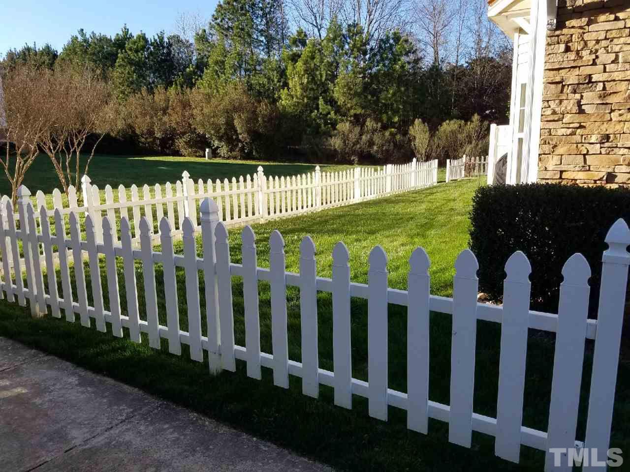 2211 Raven Road, Unit 100 Raleigh, NC 27614 - Photo 3 of 3 a view of a wooden fence