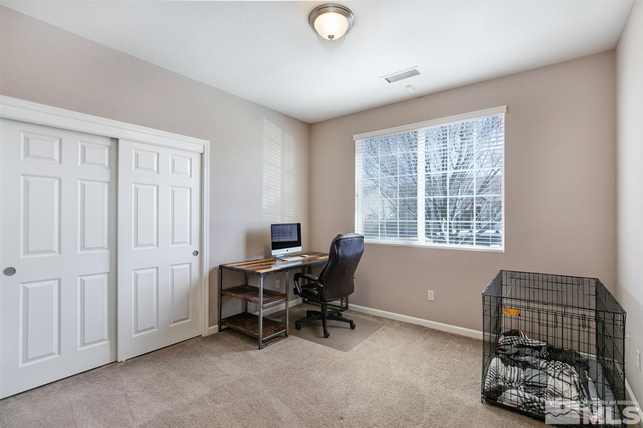 11057 Colton Drive Reno, NV 89521 - Photo 10 of 22 a view of a workspace with furniture and a window
