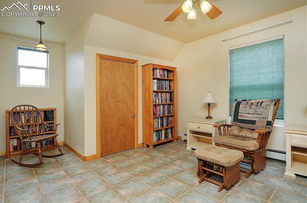 4330 Elkhorn Road Cotopaxi, CO 81223 - Photo 23 of 37 a living room with furniture a dining table and a piano table