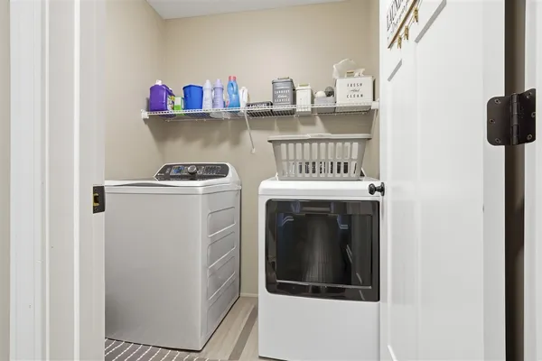 a kitchen with a stove and a refrigerator