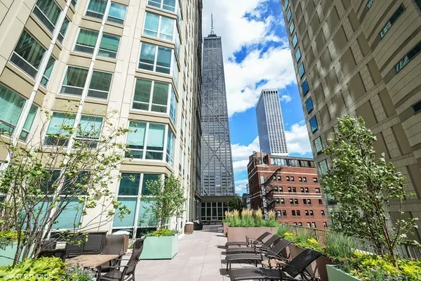 a view of outdoor dining space with a patio