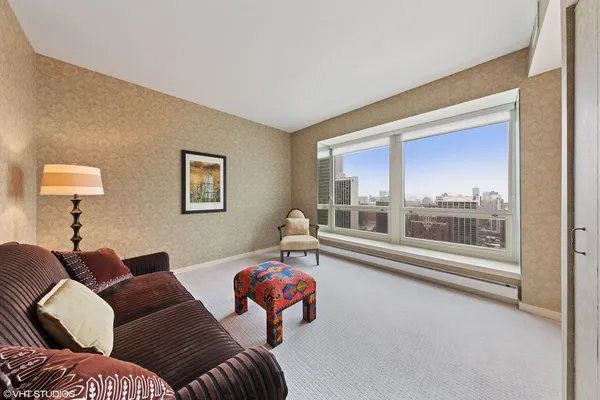 a living room with furniture and a table