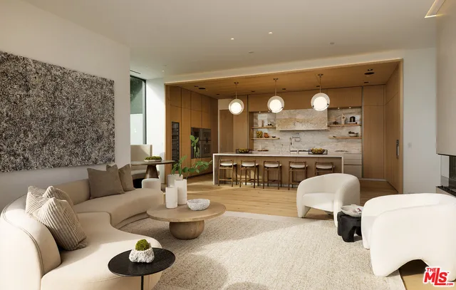 a living room with furniture and large windows