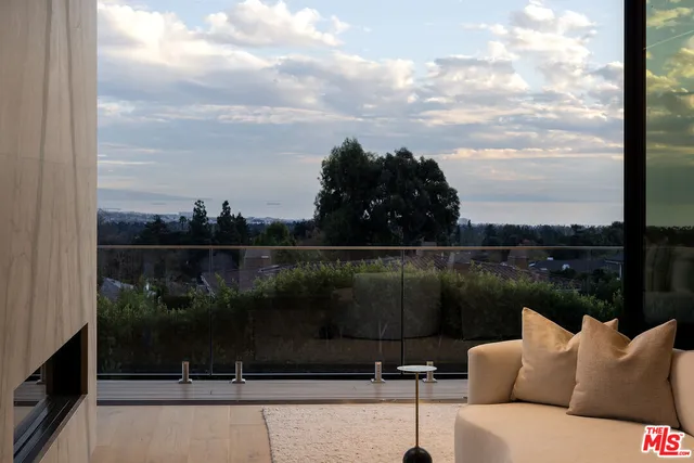 a spacious bathroom with a double vanity sink a mirror and a bathtub