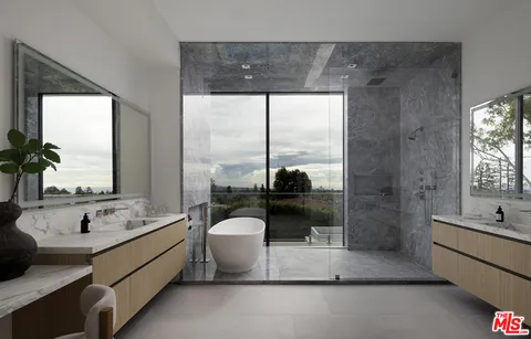 a utility room with washer and dryer