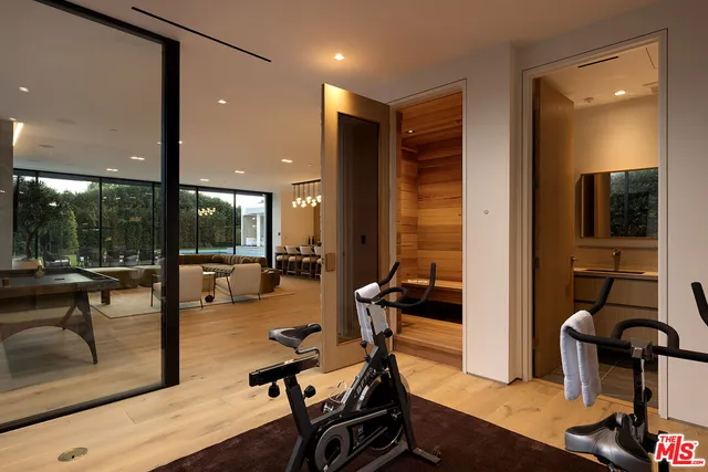 a media room with lots of chairs and a projector