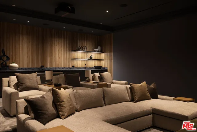 a bedroom with a bed and a balcony