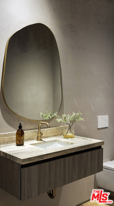 1660 Casale Road Pacific Palisades, CA 90272 - Photo 35 of 44 a close view of sink and mirror