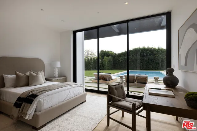 a hallway with windows and stairs