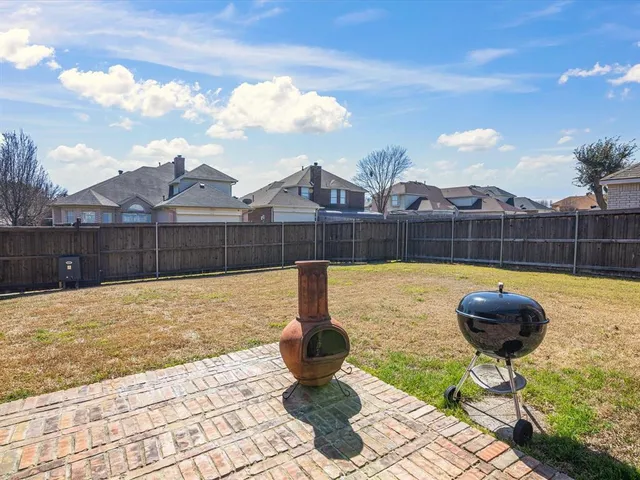 a swimming pool with a outdoor seating