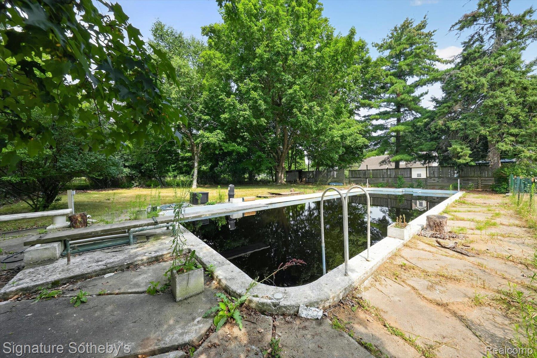 3310 Baldwin Road Metamora, MI 48455 - Photo 24 of 38 First in ground swimming pool in Michigan.