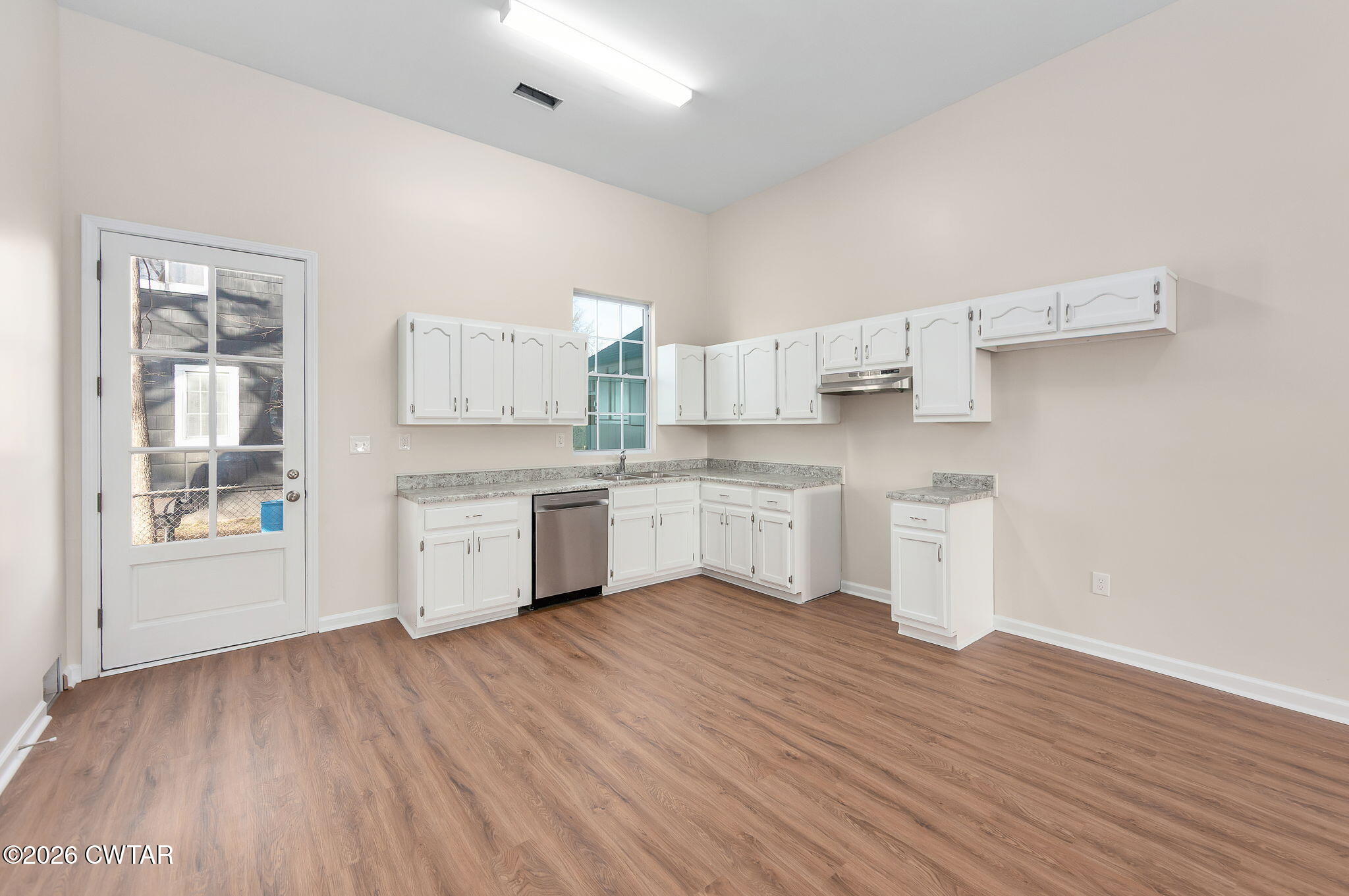 200 Lambuth Boulevard Jackson, TN 38301 - Photo 2 of 28 a kitchen with stainless steel appliances a sink and cabinets
