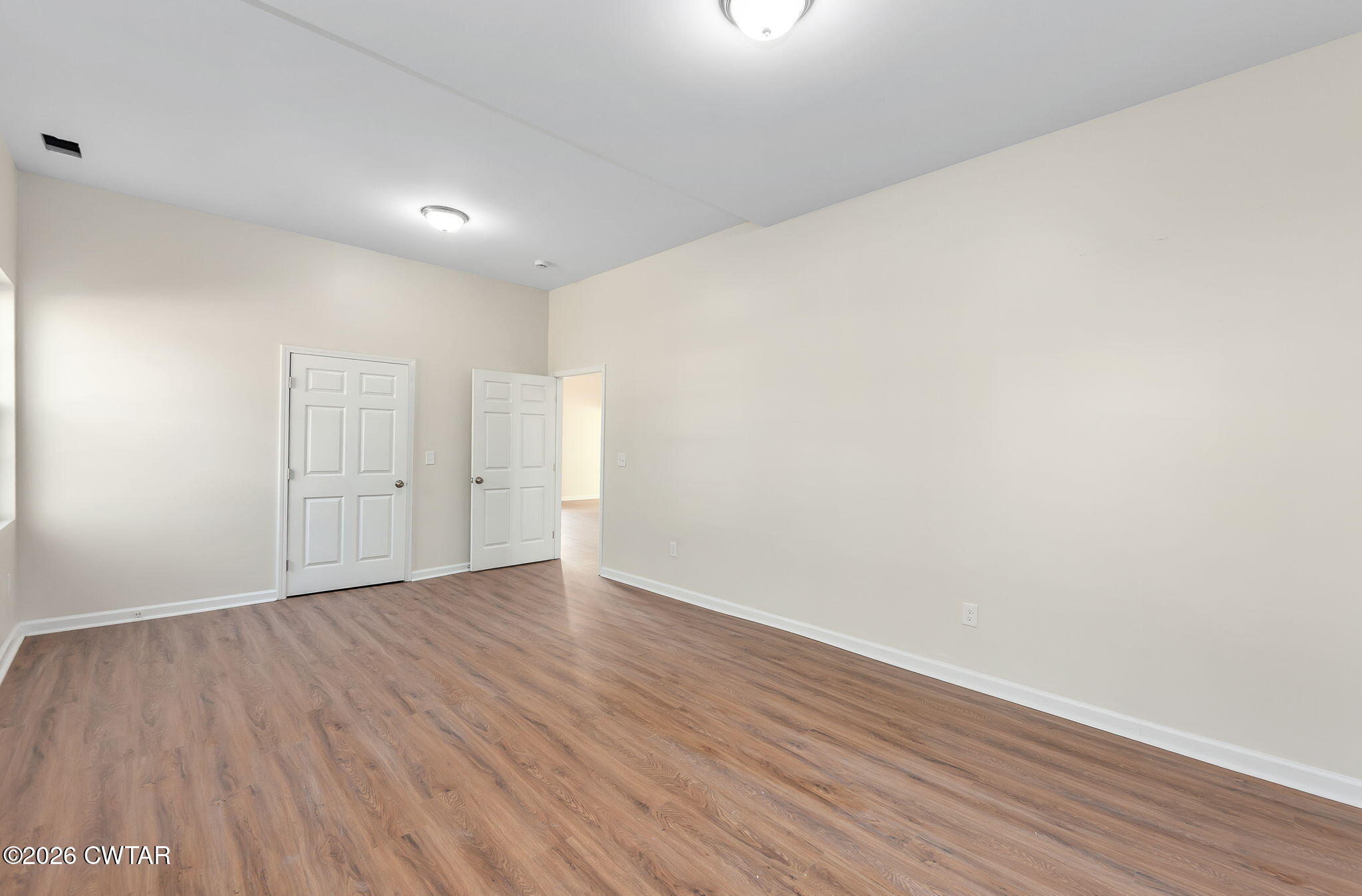 200 Lambuth Boulevard Jackson, TN 38301 - Photo 4 of 28 a view of an empty room with wooden floor